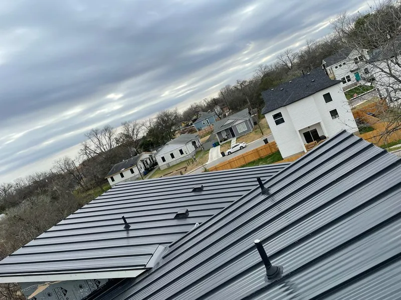 Standing seam metal roof panels with vents for Skylight Repair in Hiawatha